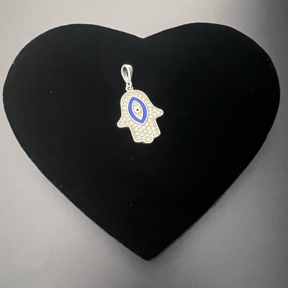 Silver pendant , evil eye